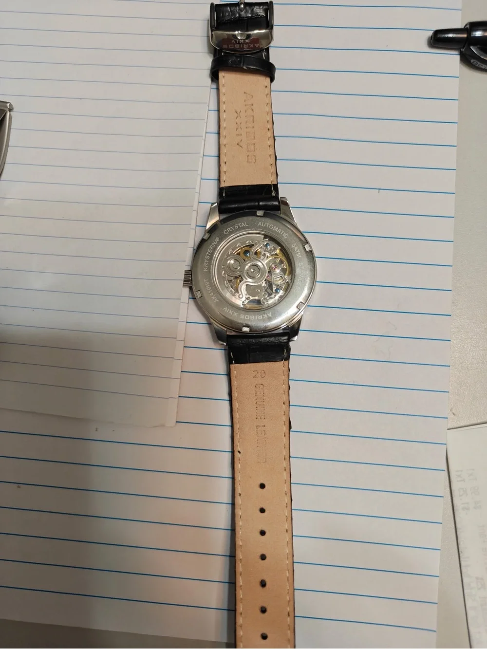 Akribos XXIV Black Leather Strap Skeleton Dial Watch with Blue Hands